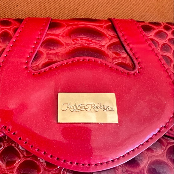 Katheryn Robbin’s red handbag / clutch.. - Picture 1 of 5